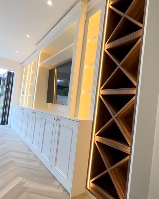 Bespoke wooden media wall with detailing and lights
