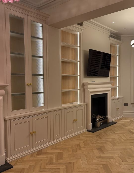 Alcove storage with glass doors, shelves and bottom cupboards