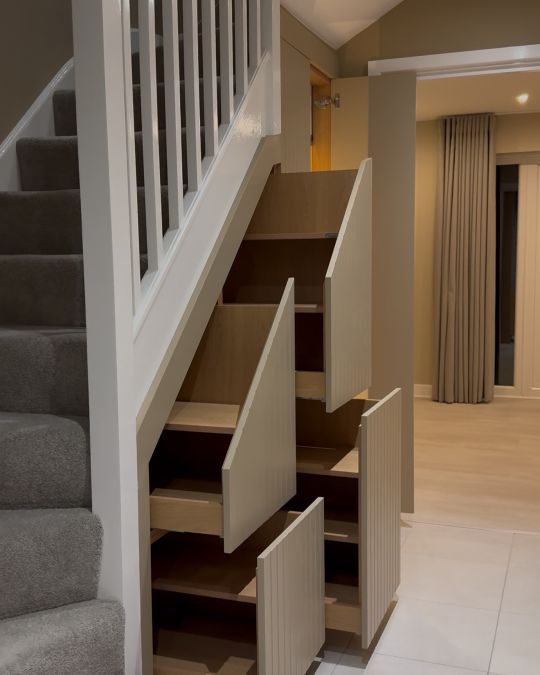 Built-in under stairs sliding drawers